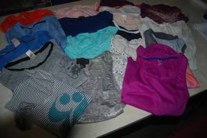 lot 99 image: 30 size XS tops...