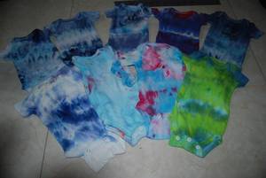 lot 153 image: All Tye Dyes are new but washed many times through the process. Sizes listed coinside with the pics. st pic are 5 premie, 2nd pic are 6 newborn,