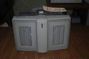 lot 19 image: ceramic heater...