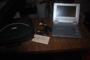lot 32 image: Curtis portable cd player...