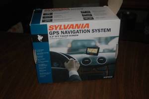 lot 38 image: Sylvania GPS navigation system...