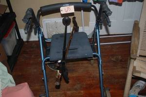 lot 65 image: Walker and 2 canes, canes have ice ...