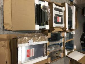 Lot of bathroom Cabinets Customer Returns See Pictures