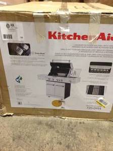 lot 14 image: Kitchen Aid 4-Burner Propane Gas Grill in Stainless Steel with Ceramic Searing Side Burner and Rotisserie Burner see pictures
