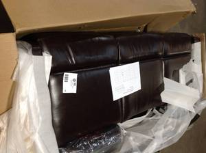 lot 45 image: Brown Solid Leather 3-Seater Motion Sofa see pictures