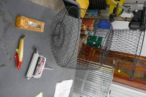 lot 52 image: Vintage Townsend fish skinner in like new condition, Schlitz spoon lure, Randall fish decoy and bait net