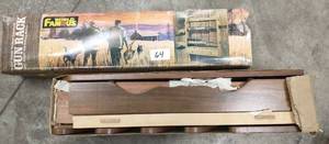 lot 64 image: gun rack new in box waiting for assembly