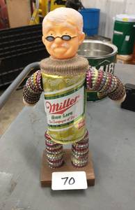 lot 70 image: Miller Beer man made from bottle caps