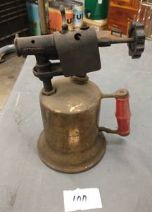 lot 100 image: Vintage torch