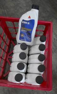lot 117 image: 11 New Quart bottles of Citgo Supergard 10W-30 motor oil
