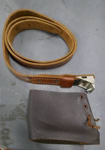lot 135 image: 50 leather belt and small rifle buttstock cover