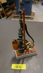 lot 162 image: Ertl cast iron hand water well pump