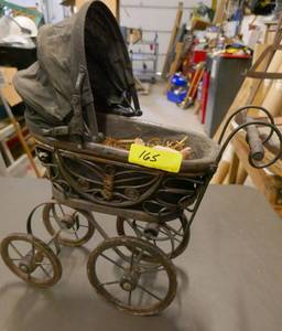lot 165 image: Vintage doll stroller made of wood and fabric basket and top 18 tall x 16 long with handle