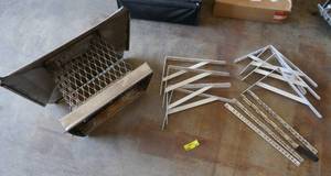 lot 209 image: Misc garage stuff, hanger brackets, socket holders, Vent cover (measures 13 inside)