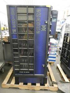 lot 244 image: Vending machine for both pop and candy.   Does not cool.