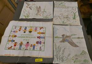 lot 254 image: Group of needlepoint and hand stitched pictures all in good condition and a doily set