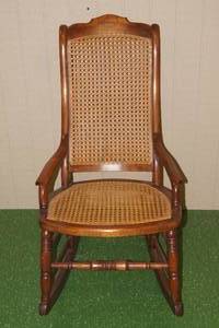 lot 6 image: Vintage Wood Frame Rocking Chair - Cane Back and Seat