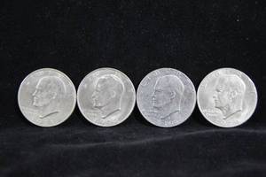 lot 42 image: 4 Eisenhower US Dollar Coins