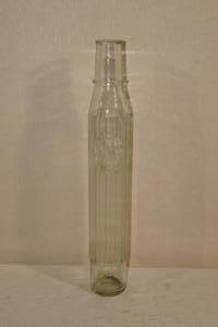lot 56 image: Antique Tioline Embossed Glass Oil Bottle - Very Rare