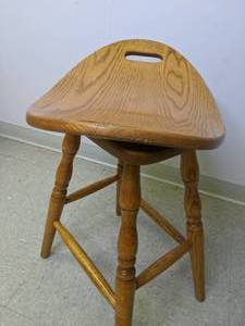 lot 911 image: Unique Lot of (2) Oak Saddle Barstools