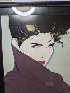 lot 966 image: Breathtaking 1985 Patrick Nagel Print, The Book