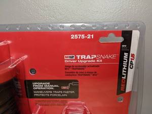 lot 27 image: New Milwaukee M12 Trap Snake 12-Volt Lithium-Ion Cordless Toilet and Urinal Auger Power Driver 1.5AH Battery and Charger