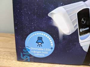 lot 10 image: Brand New Swann Wi-Fi Floodlight Security Camera