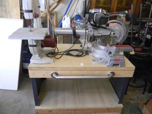 lot 50 image: CRAFTSMAN PROFFESIONAL 12 LASER SLIDE COMPOUND MITER SAW & TOOL SHOP 9 BENCH TOP BAND SAW - BOTH WORK - BOTH MOUNTED ON ROLLING STORAGE BENCH - NICE SHOP SETUP - SEE PICTURES