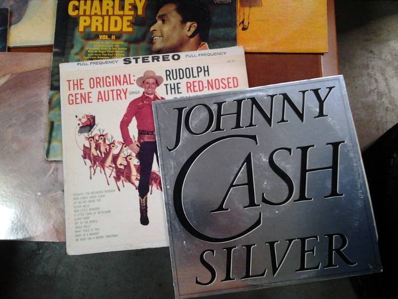 Stack of record albums from artists...