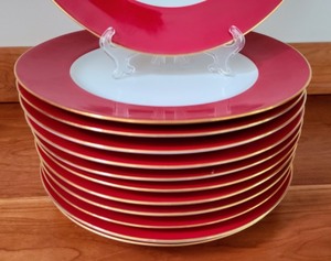 lot 46 image: Crate and Barrel RedGold Rimmed Plates