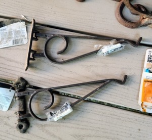 lot 103 image: Decorative Metal Plant Hangers