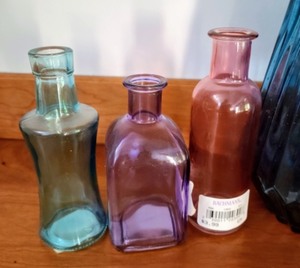 lot 110 image: Colorful Glass Bottles and Mercury Glass Lantern