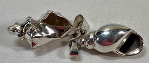 lot 454 image: Two Sterling Seashell Pendants