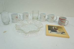 lot 58 image: Mugs, serving bowl and hot plate