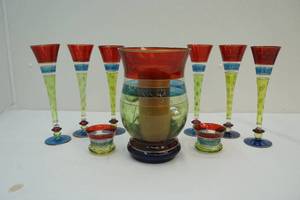 lot 59 image: Champagne flutes, vase and candle holders