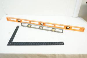 lot 89 image: Levels and framing square