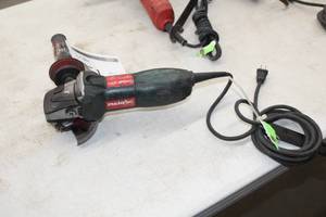 lot 151 image: Metabo W7-115  QuickProtect 4-12 Grinder 900W