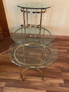 lot 30 image: Set of Three Coordinating Glass Top Accent Tables w Brass Bases