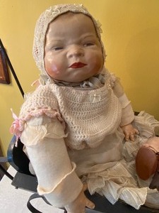 lot 182 image: Antique Doll Stroller and Three Dolls