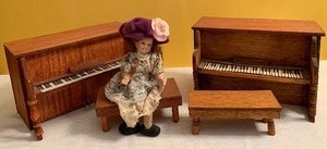 lot 150 image: Adorable Miniature Doll and Two Dollhouse Pianos