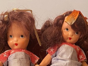 lot 294 image: Adorable Dolls on a Doll Sized Sofa