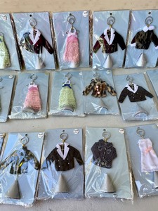 lot 373 image: Miniature Doll Outfits