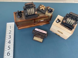 lot 405 image: Dollhouse Furniture including Pencil Sharpener Cash Registers and a Typewriter