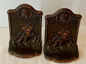 lot 436 image: Small Ship Figurine Bookends