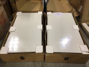 lot 25 image: Lot of 2 Nextile 30 in. x 60 in. x 60 in. 4-Piece Direct-to-Stud Alcove Tub Surround in White by Bootz Industries Customer Returns See Pictures