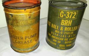 lot 77 image: Vintage Military Grease Can and Cross Country Water Pump Grease.