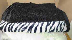 lot 96 image: Black and White Accent Throws (2) and Rug.