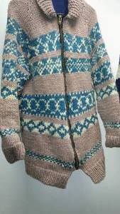 lot 244 image: Knitted Hand Crafted Sweater. (2)