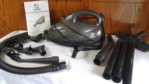 lot 293 image: Workforce Handheld VacuumBlowerInflater with attachments.