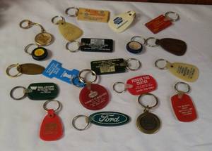 lot 801 image: Automotive Advertising Keychains .Chevrolet, Ford, Skelly.